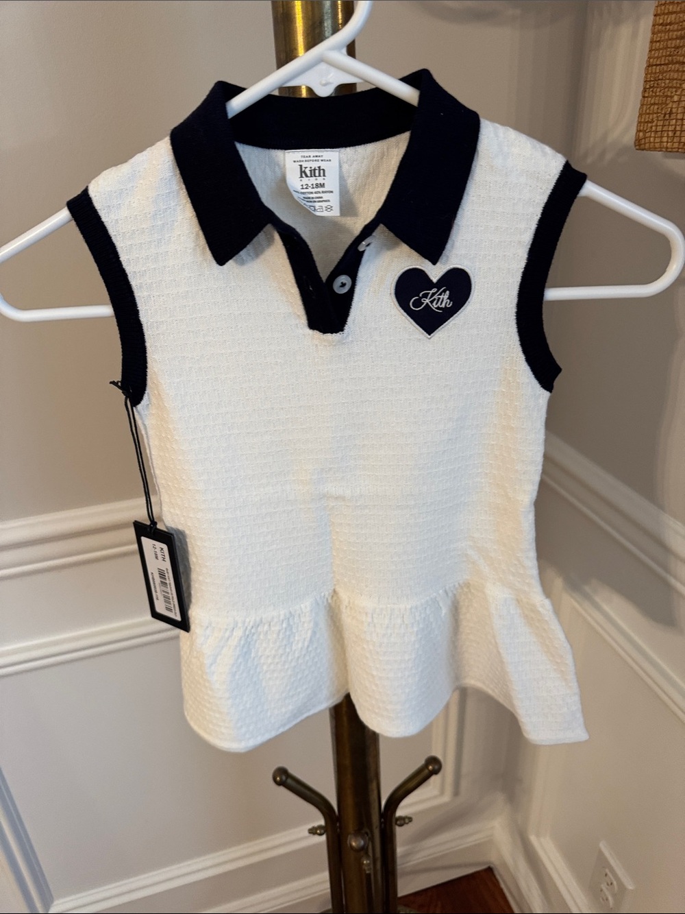 Kith White Sleeveless Polo Peplum Top with Black Trim